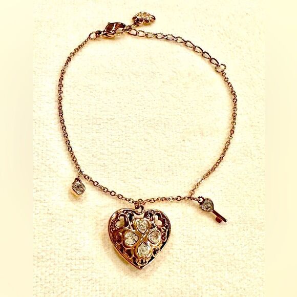 RARE SWAROVSKI ROSE GOLD TONE BRACELET WITH HEART CHARM - Picture 1 of 5